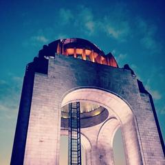 Low-angle view of the Monument to the Revolution in Mexico City.