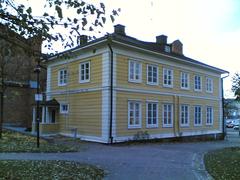 Bulevardi street in Helsinki with buildings, trees, and pedestrians