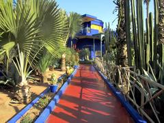 Jardin Majorelle at Marrakesh with vibrant blue structures and lush greenery