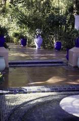 Majorelle Garden with large tiles and round fountain