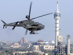 OH-58D Kiowa Warrior helicopter over Baghdad, Iraq