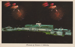 aerial view of Museum of Science and Industry with fireworks in Chicago