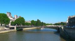 Pont d'Arcole in Paris with a view of the Seine River and surrounding architecture