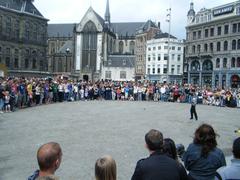 Adrian Crankz performs a comedy street show at Dam Square, Amsterdam