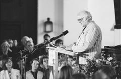 Jan Wolkers in de Nieuwe Kerk with book and art, 1992