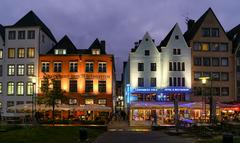 Night view of Cologne city with illuminated Cologne Cathedral and Hohenzollern Bridge