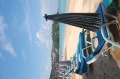 Kata Beach with clear blue waters and a sandy shore under a clear sky