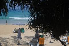 Scenic view of Kata Beach with clear blue waters and a sandy shoreline