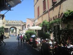 Outdoor restaurant seating area in Trastevere, Rome