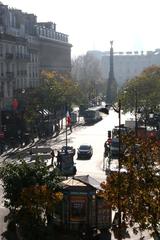 View of Rue Saint-Denis from Rue des Halles in Paris with Place du Châtelet in the background