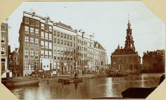 Historic photo of old houses along the Singel canal near the Munttoren in Amsterdam, dated 1883-1884