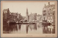 View of the Amstel River from Halvemaansbrug towards Muntplein, with Munttoren and English houses in the background, demolished in 1877