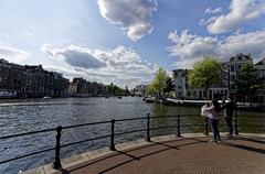 view over the river Amstel towards the Munttoren in Amsterdam