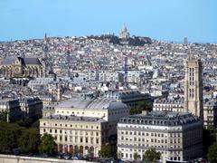 Basilica de Sacre Coeur on Montmartre hilltop overlooking Paris