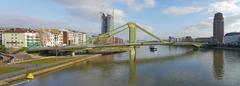 The Floesserbruecke bridge in Frankfurt with ECB building and Main Plaza in the background