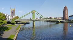 Floesserbruecke bridge in Frankfurt with ECB building and Main Plaza