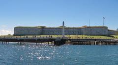 Scenic view of Castle Island Park in Boston featuring lush greenery and Fort Independence