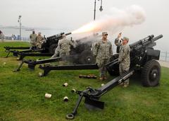 USS Constitution receives a 21-gun salute from Fort Independence on its 213th launching day anniversary