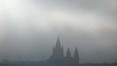 Kaiser-Jubiläums-Kirche in fog and backlight from the other side of the Danube