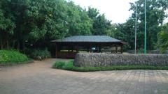 Japanese garden in Pune with traditional thatched-roof hut