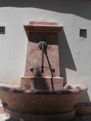 red marble wall fountain on the ground floor of the Bodor Musical Fountain on Margaret Island, Budapest, Hungary