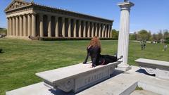 A bench at the Nashville Parthenon with a name engraved on it