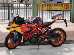 Red Bull motorcycle parked on Tsing Yi street