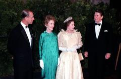 Queen Elizabeth II and Prince Philip with President Ronald Reagan and Nancy Reagan during a state dinner