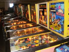 Rows of vintage pinball machines inside the Pinball Hall of Fame