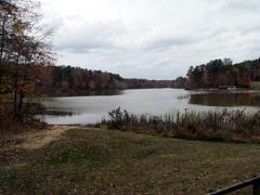 Big Lake in Umstead State Park, North Carolina with reflective water and surrounding trees