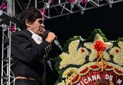 Humberto Cravioto singing with a mariachi band