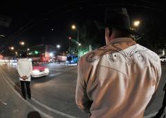 Plaza Garibaldi mariachi band in traffic