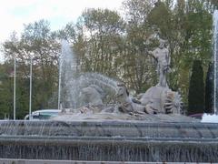 Night view of Fountain of Neptune at Plaza de Cánovas del Castillo in Madrid, Spain