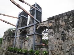 Fort San Pedro damaged entrance towers with scaffolding