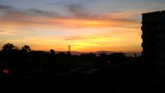 Sunrise over Bolton Street in Davao City with Samal Island on the horizon