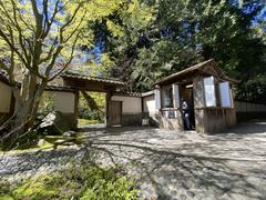 Entrance to Nitobe Garden with bamboo archway and ticket booth