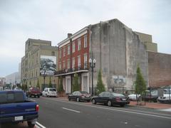 Magazine Street in the Old Warehouse District, New Orleans with early 19th century townhouses and the World War II Museum