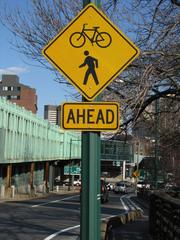 MassDOT traffic sign on Longfellow Bridge construction highlighting bicycle and pedestrian lane