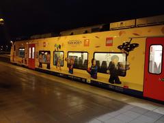 NMBS Desiro train with Lego exhibition advertisement at Bruges station