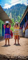 Children from Uttarakhand carrying cow milk