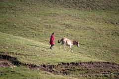 Tribal boy walking near Ali Bugyal in Uttarakhand