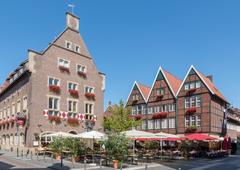 Kiepenkerl monument and Großer Kiepenkerl restaurant at Spiekerhof in Münster, Germany