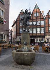 Kiepenkerl monument and Großer Kiepenkerl restaurant at Spiekerhof in Münster, Germany