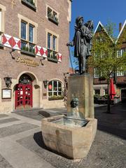 Kiepenkerldenkmal statue at Spiekerhof in Münster, Germany