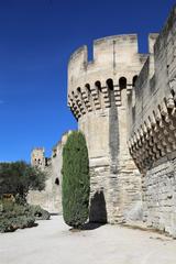 city walls of Avignon with a round tower