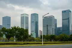 Shenzhen cityscape with modern skyscrapers and lush greenery