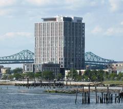 The Eddy Apartments and Tobin Memorial Bridge from Boston Harbor in 2017