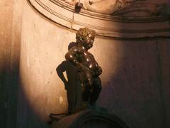 Manneken Pis statue at sunset in Brussels