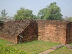 Ancient wall outside Maya Devi Temple in Nepal