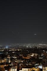 Athens at night with Mount Parnes in the distance